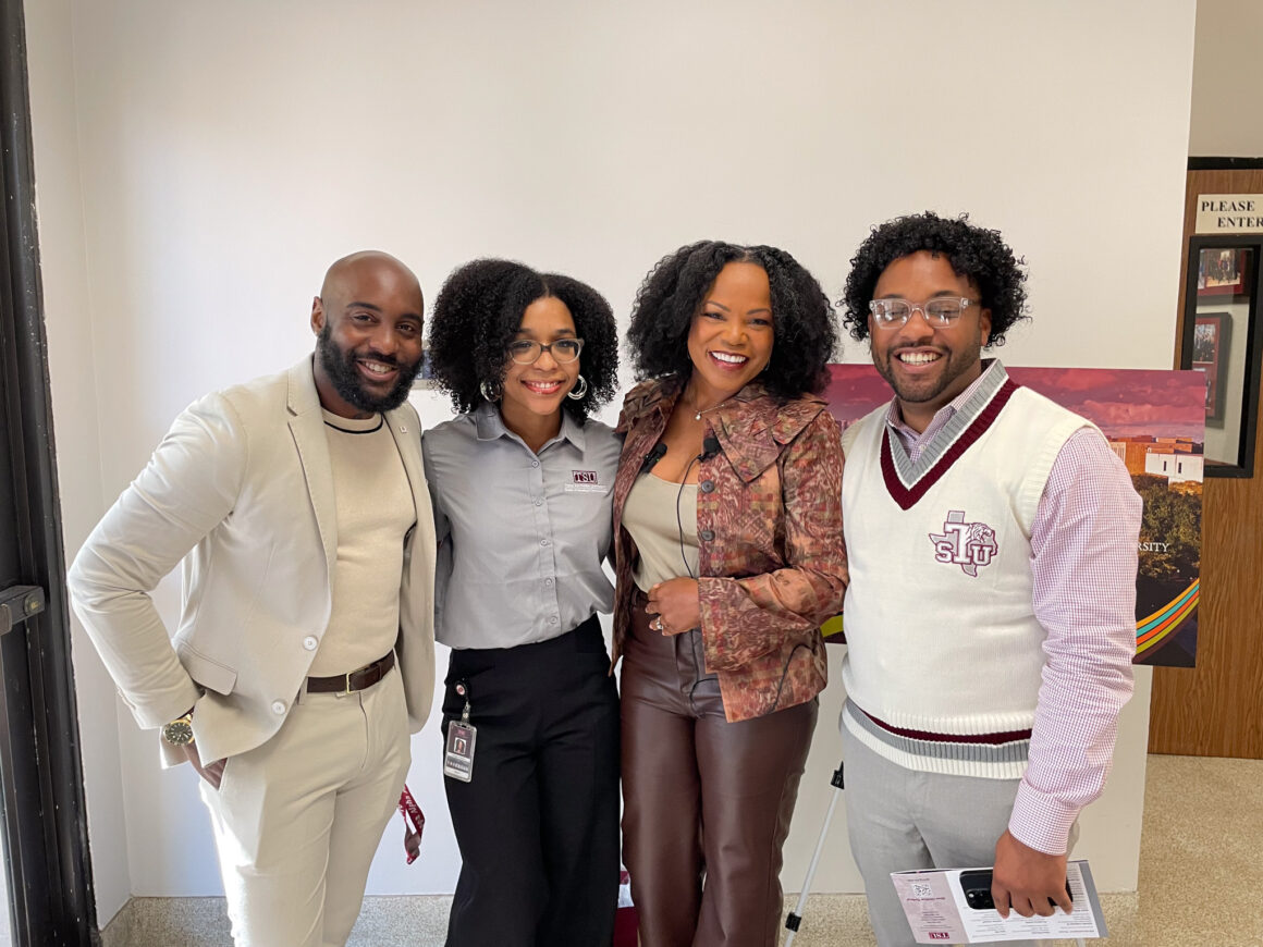 Renee poses with the TSU team after an on campus interview following the presentation of the MPoWR Her Grant