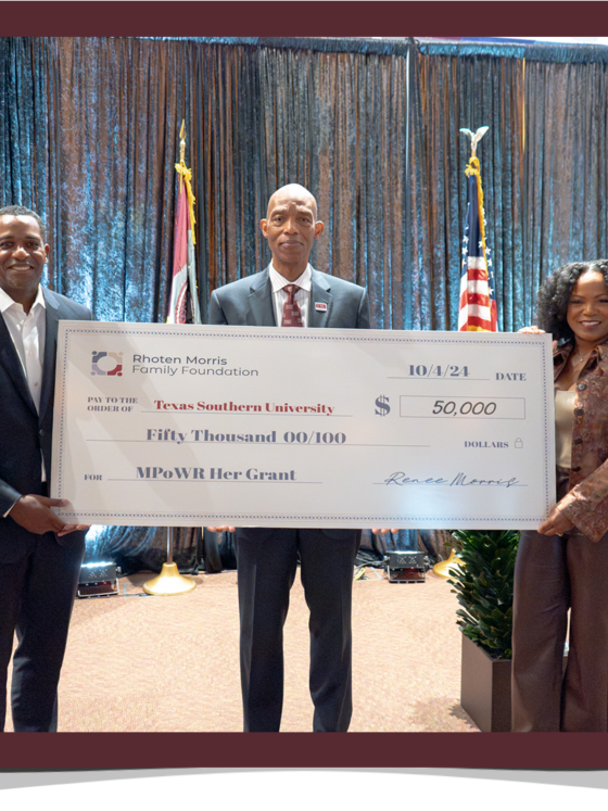 CCO Renee Morris and husband Milton Morris present $50,000 check to TSU